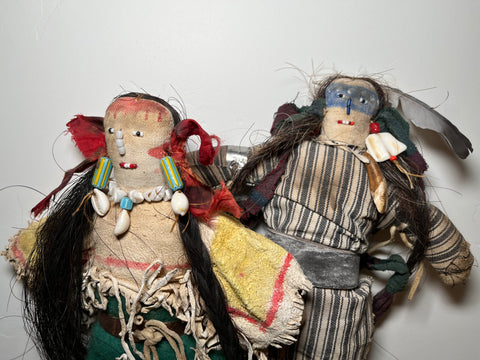 Antique Dolls. Southern Plains People. circa 1900. wonderfully adorned. wool , leather , railroad ticking, trade beads, shell, human hair.