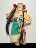 Antique Dolls. Southern Plains People. circa 1900. wonderfully adorned. wool , leather , railroad ticking, trade beads, shell, human hair.