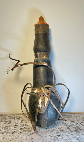 Leather banded water Gourd with Drinking Cup and Beads. 
Maasai culture 
Kenya
Circa 1980’s