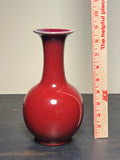 Chinese porcelain Bottle. Sang de Beouf , Oxblood , Flambé. 9” tall.