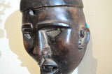 A wonderful rare Yombe ceremonial mask from the Democratic Republic of Congo estimated at 1960s. These rare realistic looking masks are worn in communal ceremonies. Very realistic facial features, rich dark brown patina and open mouth are characteristics of the Yombe style