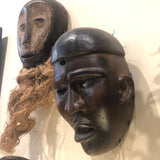 A wonderful rare Yombe ceremonial mask from the Democratic Republic of Congo estimated at 1960s. These rare realistic looking masks are worn in communal ceremonies. Very realistic facial features, rich dark brown patina and open mouth are characteristics of the Yombe style