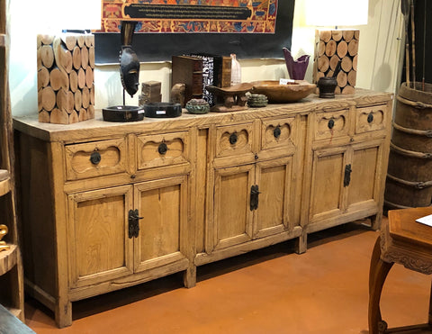 An antique Chinese sideboard circa 1900. Features six drawers over six doors. Eight feet long.  96” long x 17” deep x 37” tall  Impressive size, beautiful lines, excellent condition.