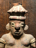 Strange Imports.  Pre-Columbian Art. Nayarit Polychrome Pottery Seated figure of a squat, compressed form with rich polychrome finish intact. Circa 100 B.C. - 250 A.D. From the estate of a Manhattan collector, originally purchased from Essex Arts in Manhattan, 1966