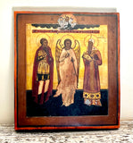 Strange Imports 
Christian Art
Antique Icon Painting 
Russian Orthodox 
Early 19th Century.

Saint Menas 
Saint Nikolai
Saint John

Egg Tempera and Gilt on Wood Panel
7.5” tall x 6.5” wide x .5” thick

Brilliant shining golden icon featuring three Saints looked over by Jesus Christ. 
Condition is commensurate with age.

