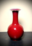 Chinese porcelain Bottle. Sang de Beouf , Oxblood , Flambé. 9” tall.