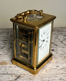 AIGUILLES BRASS AND BEVELED GLASS CARRIAGE CLOCK, FRANCE, LATE 19TH CENTURY