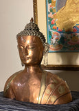 Strange Imports. Beautifully Cast Bust of Shakyamuni Buddha.  Nepal Copper with Brass Detailing.  Wonderful addition to a yoga room, meditation space or any mindful home.  Oṃ muni muni mahāmuni śākyamuni svāhā