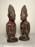 Ibeji Twins Nigeria.  Yoruba twins are extraordinary beings protected by Sango, the deity of thunder. The mother provides ritual care to the figures, bathing, dressing, adorning, and feeding them daily handling is responsible the distinctive patina.
