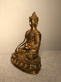 Seated Buddha Bhumisparsha mudra Bronze  9” tall Touching the Earth The moment of enlightenment for Buddha is symbolized in Bhūmisparśa Mudra. In touching the earth the Tathagata liberates himself from suffering, desire and the circle of samsara.