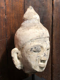 Stucco Head of a Haripunjaya Buddha. Lamphun, Thailand. Circa 1300.