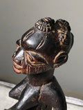 Sango - Goddess of Thunder. Carved Wood Staff Head. Yoruba, Nigeria. early 20th Century.  mounted on stand. 10" tall  'The ritual paraphernalia associated with worship of the god Sango was originally developed at the court of the kings of Oyo during the eighteenth century. Within the parameters of this artifact's basic form, the design of its shaft has been endlessly reinterpreted with great imagination by Yoruba artists.