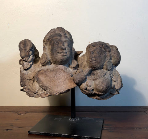 Stone sculpture of deities. Architectural fragment