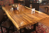 wonderful Acacia Single Slab Table, with a flock of soaring birds used as connectors. This will be the centerpiece to your home!