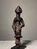 Sango - Goddess of Thunder. Carved Wood Staff Head. Yoruba, Nigeria. early 20th Century.  mounted on stand. 10" tall  'The ritual paraphernalia associated with worship of the god Sango was originally developed at the court of the kings of Oyo during the eighteenth century. Within the parameters of this artifact's basic form, the design of its shaft has been endlessly reinterpreted with great imagination by Yoruba artists.