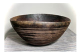 Strange Imports African Art Tuareg Bowl, Niger hand carved dark wood bowl with unique detailing. The graceful lines and subtle embellishments reflects the sophisticated culture of the Tuareg.
