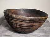 Strange Imports African Art Tuareg Bowl, Niger hand carved dark wood bowl with unique detailing. The graceful lines and subtle embellishments reflects the sophisticated culture of the Tuareg.