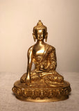 Seated Buddha Bhumisparsha mudra Bronze  9” tall Touching the Earth The moment of enlightenment for Buddha is symbolized in Bhūmisparśa Mudra. In touching the earth the Tathagata liberates himself from suffering, desire and the circle of samsara.
